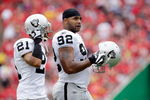 KANSAS CITY, MO - SEPTEMBER 20:  Defensive end Richard Seymour #92 of the Oakland Raiders walks onto the field with Nnamdi Asomugha #21 during the game against the Kansas City Chiefs at Arrowhead Stadium on September 20, 2009 in Kansas City, Missouri.  (Photo by Jamie Squire/Getty Images)