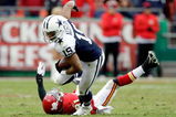 KANSAS CITY, MO - OCTOBER 11:  Miles Austin #19 of the Dallas Cowboys breaks a tackle and continues to the endzone for a touchdown to win the game in overtime during the game against the Kansas City Chiefs on October 11, 2009 at Arrowhead Stadiumin Kansas City, Missouri.  (Photo by Jamie Squire/Getty Images)