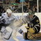 DALLAS - SEPTEMBER 16:  Goaltender Marty Turco #35 of the Dallas Stars makes a save in front of Martins Karsums #44 of the Tampa Bay Lightning and Warren Peters #25 at American Airlines Center on September 16, 2009 in Dallas, Texas.  (Photo by Ronald Martinez/Getty Images)