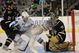 DALLAS - SEPTEMBER 16:  Goaltender Marty Turco #35 of the Dallas Stars makes a save in front of Martins Karsums #44 of the Tampa Bay Lightning and Warren Peters #25 at American Airlines Center on September 16, 2009 in Dallas, Texas.  (Photo by Ronald Martinez/Getty Images)