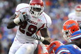 GAINESVILLE, FL - OCTOBER 17: Running back Broderick Green #29  of the Arkansas Razorbacks rushes upfield against the Florida Gators October 17, 2009 at Ben Hill Griffin Stadium in Gainesville, Florida.  (Photo by Al Messerschmidt/Getty Images)