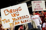 PHILADELPHIA - OCTOBER 21:  Fans of the Philadelphia Phillies hold up signs which call for the Phillies to play against the New York Yankees in the World Series after the Phillies advanced to the series with their 10-4 against the Los Angeles Dodgers in Game Five of the NLCS during the 2009 MLB Playoffs at Citizens Bank Park on October 21, 2009 in Philadelphia, Pennsylvania.  (Photo by Jeff Zelevansky/Getty Images)