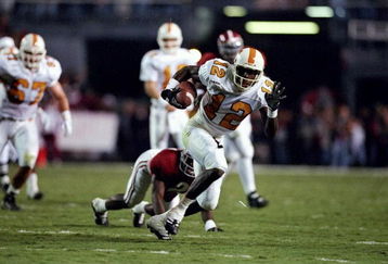18 Oct 1997: Wide receiver Marcus Nash of the Tennessee Volunteers moves the ball during a game against the Alabama Crimson Tide at Legion Field in Birmingham, Alabama. Tennessee won the game, 42-6.