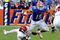 GAINESVILLE, FL - OCTOBER 17: Quarterback Tim Tebow #15 of the Florida Gators rushes upfield against the University of Arkansas Razorbacks October 17, 2009 at Ben Hill Griffin Stadium in Gainesville, Florida.  (Photo by Al Messerschmidt/Getty Images)