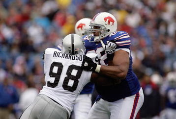 ORCHARD PARK, NY - SEPTEMBER 21:  Langston Walker #68 of the Buffalo Bills blocks Jay Richardson #98 of the Oakland Raiders during the game on September 21, 2008 at Ralph Wilson Stadium in Orchard Park, New York. (Photo by Rick Stewart/Getty Images)