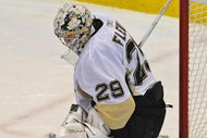 DETROIT - JUNE 12:  Marc-Andre Fleury #29 of the Pittsburgh Penguins makes a save against the Detroit Red Wings during Game Seven of the 2009 NHL Stanley Cup Finals at Joe Louis Arena on June 12, 2009 in Detroit, Michigan.  (Photo by Harry How/Getty Images)