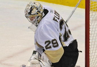 DETROIT - JUNE 12:  Marc-Andre Fleury #29 of the Pittsburgh Penguins makes a save against the Detroit Red Wings during Game Seven of the 2009 NHL Stanley Cup Finals at Joe Louis Arena on June 12, 2009 in Detroit, Michigan.  (Photo by Harry How/Getty Images)