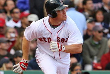 BOSTON - OCTOBER 11:  J.D. Drew #7 of the Boston Red Sox hits a two-run home run in the fourth inning against the Los Angeles Angels of Anaheim in Game Three of the ALDS during the 2009 MLB Playoffs at Fenway Park on October 11, 2009 in Boston,  Massachusetts. (Photo by Jim Rogash/Getty Images)