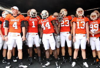 STILLWATER, OK - SEPTEMBER 5:  The Oklahoma State Cowboys wait in the tunnel before taking the field for the fourth quarter of the game against the Georgia Bulldogs at Boone Pickens Stadium on September 5, 2009 in Stillwater, Oklahoma. (Photo by Christian Petersen/Getty Images)