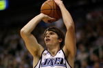 SALT LAKE CITY - APRIL 25:  Kyle Korver #26 of the Utah Jazz shoots in Game Four of the Western Conference Quarterfinals against the Los Angeles Lakers during the 2009 NBA Playoffs at Energy Solutions Arena on April 25, 2009 in Salt Lake City, Utah.  The Lakers won 108-94.  NOTE TO USER: User expressly acknowledges and agrees that, by downloading and/or using this Photograph, user is consenting to the terms and conditions of the Getty Images License Agreement.  (Photo by Otto Greule Jr/Getty Images)  