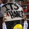ANAHEIM, CA - OCTOBER 09:  A fan of the Los Angeles Angels of Anaheim dressed as 'Homer Simpson' hold a sign in support of the Angels during Game Two of the ALDS against the Boston Red Sox during the 2009 MLB Playoffs at Angel Stadium on October 9, 2009 in Anaheim, California.  (Photo by Jacob de Golish/Getty Images)