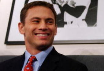 BOSTON, MA - DECEMBER 12: Red Sox CEO/President Larry Lucchino (R) introduces Co-General Managers Ben Cherington (not pictured) and Jed Hoyer (L) December 12, 2005 at a press conference at Fenway Park in Boston, Massachusetts. Both Cherington and Hoyer have been with the Red Sox in other capacities for a number of years, and helped in the latest transitions following the resignation of former GM Theo  Epstein.  Photo by Darren McCollester/Getty Images)
