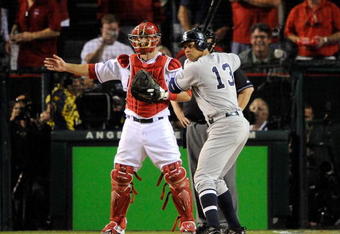 ANAHEIM, CA - OCTOBER 22:  Alex Rodriguez #13 of the New York Yankees is intentionally walked as Jeff Mathis #5 of the Los Angeles Angels of Anaheim calls the play in the ninth inning of Game Five of the ALCS during the 2009 MLB Playoffs at Angel Stadium on October 22, 2009 in Anaheim, California.  The Angels defeated the Yankees 7-6.  (Photo by Jeff Gross/Getty Images)