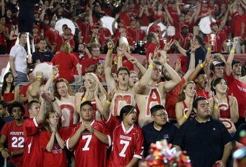 HOUSTON - SEPTEMBER 26: UH fans cheer on the Houston Cougars while the play against the Texas Tech Red Raiders at Robertson Stadium on September 26, 2009 in Houston, Texas.  (Photo by Thomas B. Shea/Getty Images)