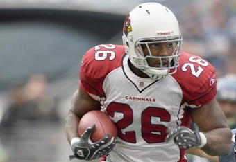 SEATTLE - OCTOBER 18:  Beanie Wells #26 of the Arizona Cardinals carries the ball during the game against the Seattle Seahawks on October 18, 2009 at Qwest Field in Seattle, Washington. (Photo by Otto Greule Jr/Getty Images)   