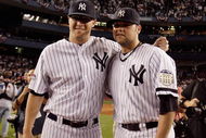 NEW YORK - SEPTEMBER 21: Phil Hughes #65 (L) and Joba Chamberlain #62 of the New York Yankees pose for a photograph after the last regular season game at Yankee Stadium on September 21, 2008 in the Bronx borough of New York City. The Yankees are playing their final season in the 85 year old ball park and plan on moving into the new Yankee Stadium across the street to start the 09 season. (Photo by Jim McIsaac/Getty Images) 