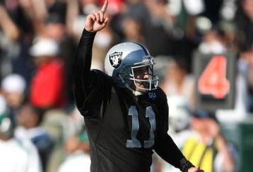 OAKLAND, CA - OCTOBER 19:  Sebastian Janikowski #11 of the Oakland Raiders celebrates after kicking a 57 yard field goal in overtime against the New York Jets during an NFL game on October 19, 2008 at the Oakland-Alameda County Coliseum in Oakland, California.  (Photo by Jed Jacobsohn/Getty Images)