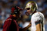 CHAPEL HILL, NC - OCTOBER 22:  Florida State Seminoles Offensive Coordinator Jimbo Fisher speaks with his quarterback Christian Ponder #7 during their game against the North Carolina Tar Heels at Kenan Stadium on October 22, 2009 in Chapel Hill, North Carolina.  (Photo by Scott Halleran/Getty Images)