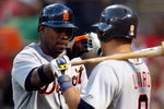 ARLINGTON, TX - JULY 29:  Marcus Thames #33 of the Detroit Tigers celebrates his solo home run with Gerald Laird #8 during action against the Texas Rangers on July 29, 2009 at Rangers Ballpark in Arlington, Texas.  (Photo by Ronald Martinez/Getty Images)