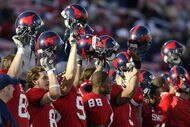 DALLAS - NOVEMBER 29: Members of the Southern Methodist University Mustangs cheer the start of the second half against the Texas Christian University Horned Frogs despite looking at an 0-11 season November 29, 2003 at Gerald J. Ford Stadium in Dallas, Texas. TCU won 20-13. (Photo by Brian Bahr/Getty Images)
