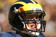 ANN ARBOR, MI - SEPTEMBER 19: Quarterback Tate Forcier #5 of the Michigan Wolverines looks on in the game against the Eastern Michigan Eagles at Michigan Stadium on September 19, 2009 in Ann Arbor, Michigan. Michigan won 45-17. (Photo by Stephen Dunn/Getty Images)