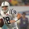 MIAMI GARDENS, FL - FEBRUARY 04:  Quarterback Peyton Manning #18 of the Indianapolis Colts scrambles with the ball during Super Bowl XLI against the Chicago Bears on February 4, 2007 at Dolphin Stadium in Miami Gardens, Florida. The Colts defeated the Bears 29-17. (Photo by Jonathan Daniel/Getty Images)