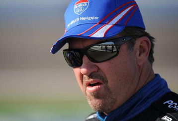 LAS VEGAS - SEPTEMBER 26: Mike Skinner, driver of the #5 PC Miller Navigator Toyota, stands during qualifying for the NASCAR Camping World Truck Series Las Vegas 350 at Las Vegas Motor Speedway on September 26, 2009 in Las Vegas, Nevada. (Photo by Harry How/Getty Images)