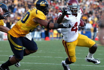 BERKELEY, CA - OCTOBER 03:  Joe McKnight #4 of the USC Trojans runs against Mychal Kendricks #30 of the California Golden Bears at Memorial Stadium on October 3, 2009 in Berkeley, California.  (Photo by Jed Jacobsohn/Getty Images)