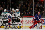 NEW YORK - OCTOBER 19: The San Jose Sharks surround Devin Setoguchi #16 after his first of two second period goals against Steve Valiquette #40 of the New York Rangers at Madison Square Garden on October 19, 2009 in New York, New York. (Photo by Bruce Bennett/Getty Images)
