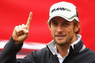 LONDON, ENGLAND - OCTOBER 20:  New Formula One World Champion Jenson Button of Great Britain and Brawn GP poses for Virgin Media's SpeedWeek50 photocall at Bluewater Shopping Centre on October 20, 2009 in London, England.  (Photo by Paul Gilham/Getty Images)