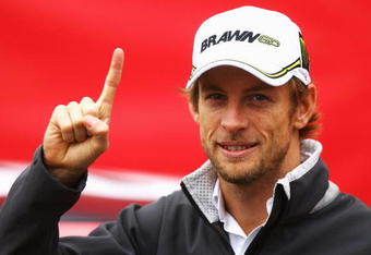 LONDON, ENGLAND - OCTOBER 20:  New Formula One World Champion Jenson Button of Great Britain and Brawn GP poses for Virgin Media's SpeedWeek50 photocall at Bluewater Shopping Centre on October 20, 2009 in London, England.  (Photo by Paul Gilham/Getty Images)