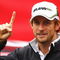 LONDON, ENGLAND - OCTOBER 20:  New Formula One World Champion Jenson Button of Great Britain and Brawn GP poses for Virgin Media's SpeedWeek50 photocall at Bluewater Shopping Centre on October 20, 2009 in London, England.  (Photo by Paul Gilham/Getty Images)