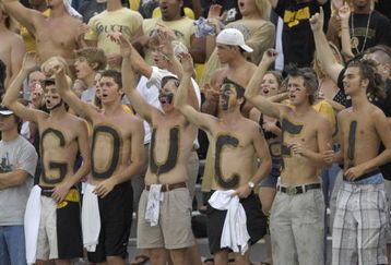 ORLANDO, FL - OCTOBER 20: Fans of the University of Central Florida Golden Knights cheer play against the Tulsa Golden Hurricane at Bright House Stadium on October 20, 2007 in Orlando, Florida.  UCF won 44 - 23. (Photo by Al Messerschmidt/Getty Images)