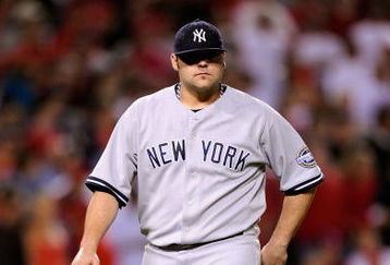 ANAHEIM, CA - OCTOBER 22:  Joba Chamberlain #62 of the New York Yankees leaves the mound after being relieved by teammate Mariano Rivera #42 (Not Shown) during the eight inning in Game Five of the ALCS against the Los Angeles Angels of Anaheim during the 2009 MLB Playoffs at Angel Stadium on October 22, 2009 in Anaheim, California.  (Photo by Kevork Djansezian/Getty Images)