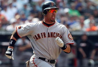 NEW YORK - AUGUST 16:  Travis Ishikawa #10 of the San Francisco Giants runs against the New York Mets on August 16, 2009 at Citi Field in the Flushing neighborhood of the Queens borough of New York City.  (Photo by Jim McIsaac/Getty Images)