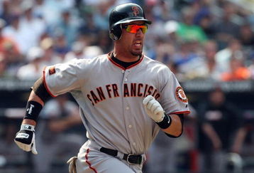 NEW YORK - AUGUST 16:  Travis Ishikawa #10 of the San Francisco Giants runs against the New York Mets on August 16, 2009 at Citi Field in the Flushing neighborhood of the Queens borough of New York City.  (Photo by Jim McIsaac/Getty Images)