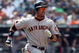 NEW YORK - AUGUST 16:  Travis Ishikawa #10 of the San Francisco Giants runs against the New York Mets on August 16, 2009 at Citi Field in the Flushing neighborhood of the Queens borough of New York City.  (Photo by Jim McIsaac/Getty Images)