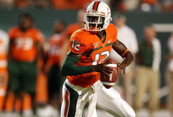 MIAMI GARDENS, FL - SEPTEMBER 17:  Quarterback Jacory Harris #12 of the Miami Hurricanes scrambles against the Georgia Tech Yellow Jackets at Land Shark Stadium on September 17, 2009 in Miami Gardens, Florida. Miami defeated Georgia Tech 33-17.  (Photo by Doug Benc/Getty Images)