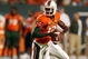 MIAMI GARDENS, FL - SEPTEMBER 17: Quarterback Jacory Harris #12 of the Miami Hurricanes scrambles against the Georgia Tech Yellow Jackets at Land Shark Stadium on September 17, 2009 in Miami Gardens, Florida. Miami defeated Georgia Tech 33-17. (Photo by Doug Benc/Getty Images)