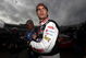 MARTINSVILLE, VA - OCTOBER 23:  Jeff Gordon, driver of the #24 DuPont/NationalGuard.com Chevrolet, walks in the garage area prior to practice for the NASCAR Sprint Cup Series TUMS Fast Relief 500 at Martinsville Speedway on October 23, 2009 in Martinsville, Virginia.  (Photo by Streeter Lecka/Getty Images)