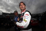 MARTINSVILLE, VA - OCTOBER 23:  Jeff Gordon, driver of the #24 DuPont/NationalGuard.com Chevrolet, walks in the garage area prior to practice for the NASCAR Sprint Cup Series TUMS Fast Relief 500 at Martinsville Speedway on October 23, 2009 in Martinsville, Virginia.  (Photo by Streeter Lecka/Getty Images)