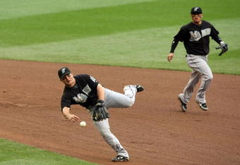 NEW YORK - SEPTEMBER 28: Dan Uggla #6 the Florida Marlins makes an off balance throw to get Marlon Anderson of the New York Mets in the eighth inning during the last regular season baseball game ever played in Shea Stadium on September 28, 2008 in the Flushing neighborhood of the Queens borough of New York City. The Mets plan to start next season at their new stadium Citi Field after playing in Shea for over 44 years.  (Photo by Nick Laham/Getty Images)
