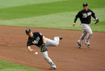 NEW YORK - SEPTEMBER 28: Dan Uggla #6 the Florida Marlins makes an off balance throw to get Marlon Anderson of the New York Mets in the eighth inning during the last regular season baseball game ever played in Shea Stadium on September 28, 2008 in the Flushing neighborhood of the Queens borough of New York City. The Mets plan to start next season at their new stadium Citi Field after playing in Shea for over 44 years.  (Photo by Nick Laham/Getty Images)