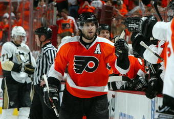 PHILADELPHIA - APRIL 19:  Simon Gagne #12 of the Philadelphia Flyers skates against of the Pittsburgh Penguins during Game Three of the Eastern Conference Quarterfinal Round of the 2009 NHL Stanley Cup Playoffs  at the Wachovia Center on April 19, 2009 in Philadelphia, Pennsylvania. The Flyers won the game 6-3 to cut the Penguins lead in the series to two games to one.  (Photo by Jim McIsaac/Getty Images)