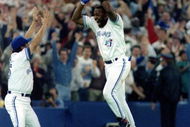 23 Oct 1993: Joe Carter of the Toronto Blue Jays celebrates his 9th inning, 3 run homerun to defeat the Philadelphia Phillies 8-6 to win the 1993 World Series at the Skydome in Toronto, Canada.