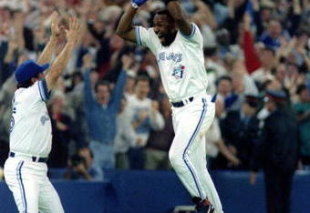 23 Oct 1993: Joe Carter of the Toronto Blue Jays celebrates his 9th inning, 3 run homerun to defeat the Philadelphia Phillies 8-6 to win the 1993 World Series at the Skydome in Toronto, Canada.