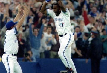 23 Oct 1993: Joe Carter of the Toronto Blue Jays celebrates his 9th inning, 3 run homerun to defeat the Philadelphia Phillies 8-6 to win the 1993 World Series at the Skydome in Toronto, Canada.