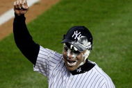 NEW YORK - OCTOBER 17:  Jerry Hairston Jr. of the New York Yankees is hit in the face with a pie after scoring the winning run for a 4-3 victory over the Los Angeles Angels of Anaheim in the bottom of the 13th inning of Game Two of the ALCS during the 2009 MLB Playoffs at Yankee Stadium on October 17, 2009 in the Bronx borough of New York City.  (Photo by Jim McIsaac/Getty Images)