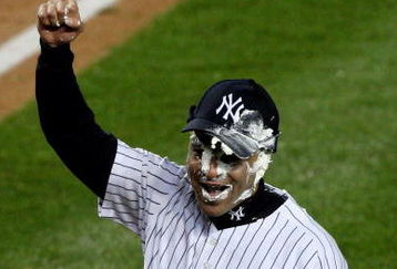 NEW YORK - OCTOBER 17:  Jerry Hairston Jr. of the New York Yankees is hit in the face with a pie after scoring the winning run for a 4-3 victory over the Los Angeles Angels of Anaheim in the bottom of the 13th inning of Game Two of the ALCS during the 2009 MLB Playoffs at Yankee Stadium on October 17, 2009 in the Bronx borough of New York City.  (Photo by Jim McIsaac/Getty Images)
