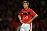 MANCHESTER, ENGLAND - SEPTEMBER 23:  Michael Owen of Manchester United in action during the Carling Cup Third Round match between Manchester United and Wolverhampton Wanderers at Old Trafford on September 23, 2009 in Manchester, United Kingdom.  (Photo by Laurence Griffiths/Getty Images)